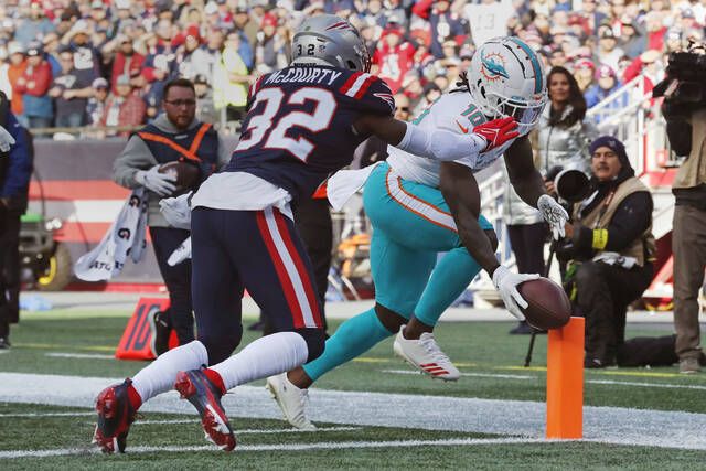 Philadelphia, PA, USA. 19th Aug, 2021. New England Patriots defensive back  KYLE DUGGER (23) takes the field during a time out in the mist of a  preseason game between the New England