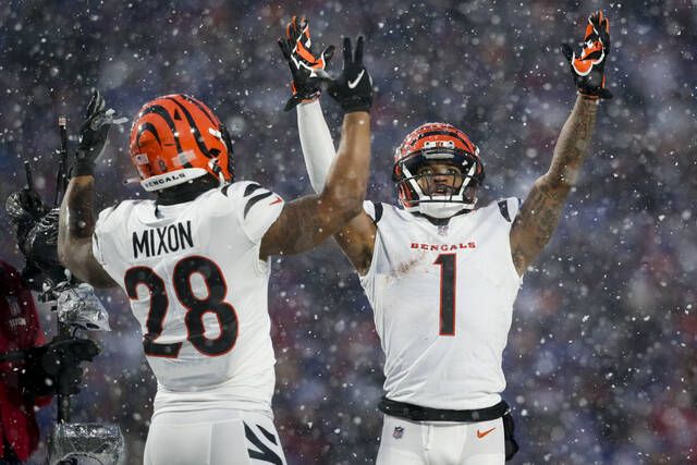 Bengals win first playoff game in 31 years, set the table for a