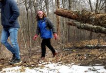 
			
				                                Rachael Stark of the Pennsylvania Environmental Council navigates around a fallen tree on the D&L Black Diamond Trail in Wright Township as she walked behind to trail walkers Saturday afternoon.
                                 Fred Adams | For Times Leader

			
		