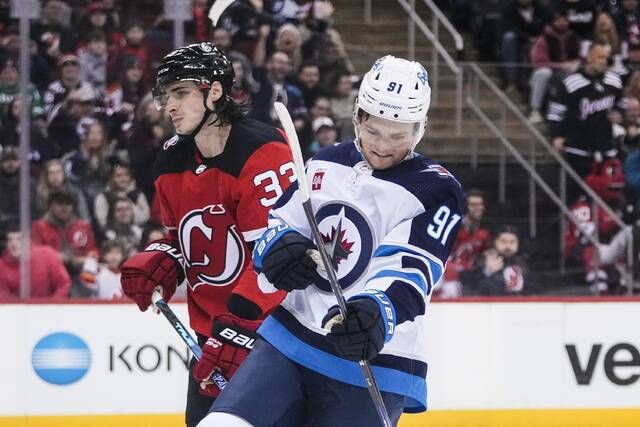 Hellebuyck, Pionk, Connor lead Jets to 2-1 win over Oilers - The