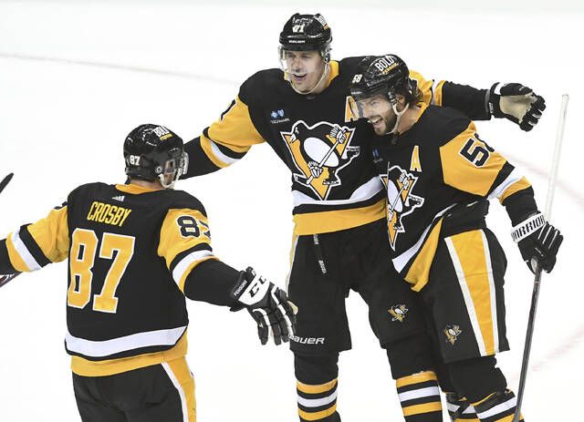 Letang scores two, leads Penguins in OT