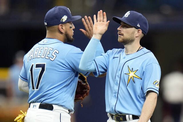 Rangers score 3 in 9th off A's bullpen, win 4-1