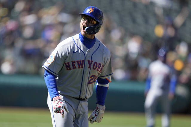 Mets rally to beat Athletics 4-3 in 10 innings