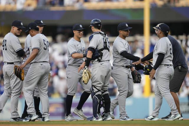 Yankees score runs in final three innings for 4-1 victory over Dodgers