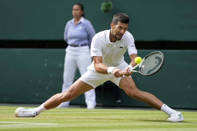 Spain's Carlos Alcaraz beats Novak Djokovic to win men's singles final at  Wimbledon