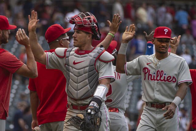 Philadelphia Phillies' Scott Rolen scores on a solo second-inning