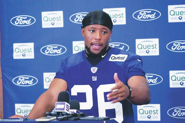 Giants' Saquon Barkley considering holding out after failing to get a new  deal