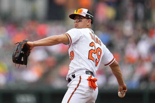 AL-leading Orioles finish off 3-game sweep of Mets with 2-0 victory