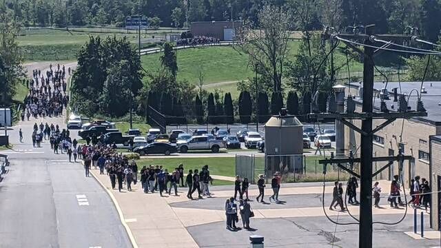 
			
				                                Students return to Hanover Area Jr./Sr. High School after a threat resulted in an evacuation of all district schools Friday afternoon. Ed Lewis | Times Leader
 
			
		