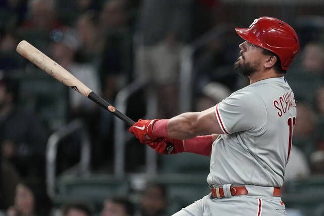 Homers lead Phillies over Braves