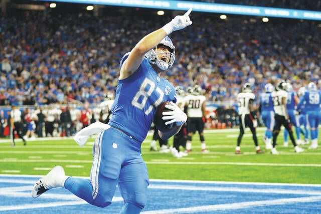 Lions maul Packers to take NFC North division lead