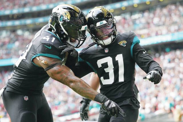 Lawrence, Ridley and defense help Jaguars beat Falcons 23-7 in London, National