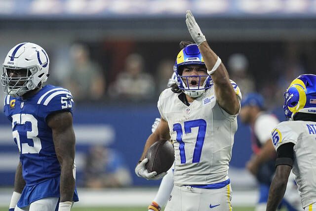 Los Angeles Rams quarterback Matthew Stafford (9) attempts a pass during a  NFL divisional playo …