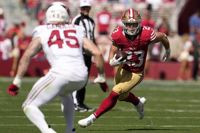 Christian McCaffrey's monster performance powers 49ers to 35-16 win over  Cardinals