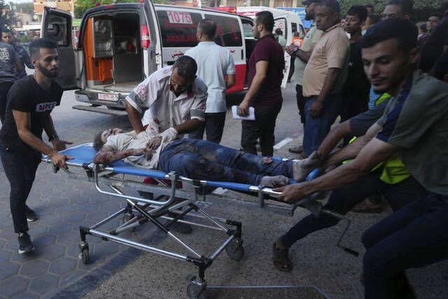 Israeli airstrikes crush apartments in Gaza - Times Leader