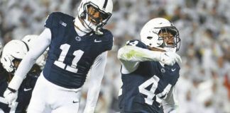
			
				                                Penn State defensive end Chop Robinson (44) and linebacker Abdul Carter (11) both earned first-team All-Big Ten selections on Tuesday.
                                 Barry Reeger | AP file photo

			
		