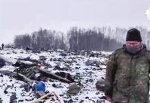 
			
				                                In this photo taken from video released by Russian Investigative Committee on Friday in Russian Investigative Committee employee walks in a place with wreckage of the Russian military Il-76 plane crashed area near Yablonovo, Belgorod region of Russia, on Thursday.
                                 AP photo

			
		