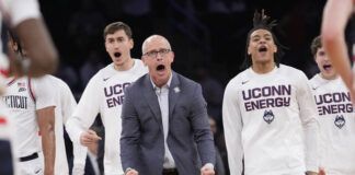 
			
				                                UConn coach Dan Hurley and players react during the first half of the tema’s NCAA college basketball game against St. John’s in the semifinals of the Big East men’s tournament Friday, March 15, 2024, in New York. (AP Photo/Mary Altaffer)
 
			
		