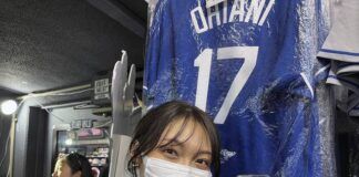 
			
				                                Hina Kishi shows off the Shohei Ohtani design on her smart phone as she shops last month at a sporting goods store, “SELECTION,” in Shinjuku district in Tokyo.
                                 AP photo

			
		