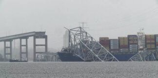 
			
				                                A container ship rests against the wreckage of the Francis Scott Key Bridge on Thursday in Baltimore, Md. After days of searching through murky water for the workers missing after the bridge collapsed, officials are turning their attention Thursday to what promises to be a massive salvage operation.
                                 AP Photo

			
		